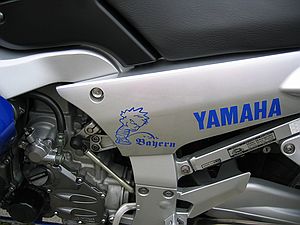 Swing-arm sticker